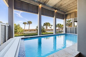 Swimming Pool Overlooking Beach and Yard.