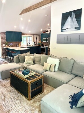 Great room features, designer sectional cathedral ceilings.