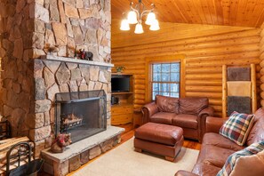 Upstairs parlor. Oversized fireplace, Roku TV