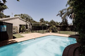 Private pool oasis awaits your relaxation.