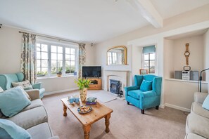 East Cottage, Langton Herring, Weymouth: The sitting room with beautiful views from the window