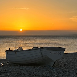 Enjoy beautiful sunsets on Chesil Beach