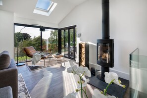 Stylish & Relaxing Open Plan Living area with log burner.