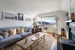 Living room at Porth Beach House, Porth, Cornwall, self catering with Beach Retreats.
