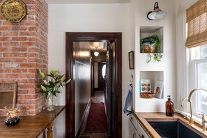 Kitchen/Exposed Chimney/Wrap-Around Island/Entry Hallway