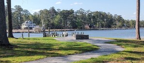 View from house of walkway, patio and firepit