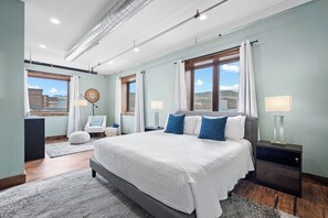 The primary suite with tons of natural light and room darkening curtains.