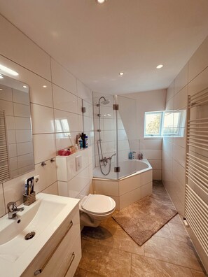 Bathroom, bathtub, shower, toilet, heating