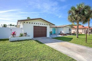 Driveway Of Lover`s Key with One Car Garage