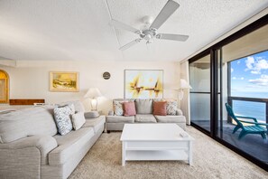 Plenty of spots for the family to get cozy in this living room.