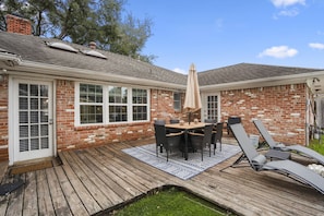 Embracing the simple joys of life on our cozy back porch.