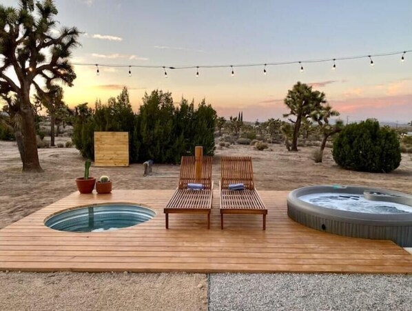 Deck with Cowboy Pool, Hot Tub and Lounge Chairs.