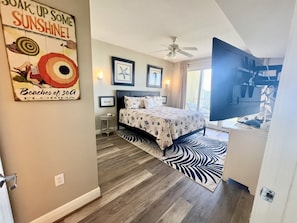 Master bedroom: king bed, balcony access, awesome view, and ensuite bathroom