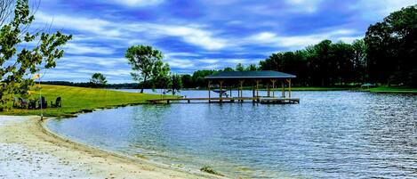 Delight in outdoor adventures with a private beach and boat dock!