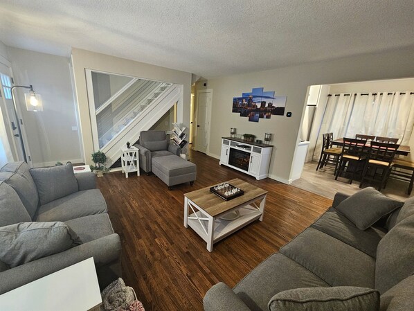 Nice, open visiting space for your family and friends.  Variety of seating and a cozy fireplace