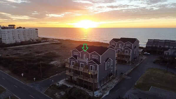 Beautiful sunrise view. Our townhome is in the middle, indicated by the arrow.