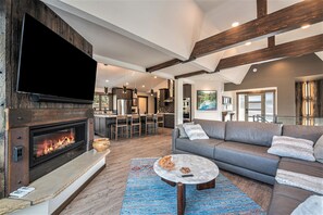 Luxurious living room with gas fireplace.