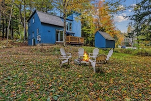 Cozy up by the firepit! 6 chairs are provided for your convenience. The fire pit is unavailable during the winter months