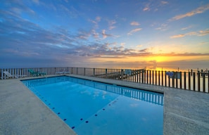 Corpus Christi oasis features a community pool on the water's edge.