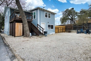 Parking area and huge backyard.