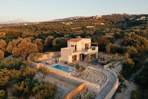 Aerial photo of the Villa. It is located in an Olive Grove with stunning View