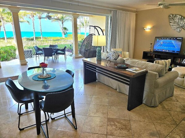 Dining room and living room overlooking the gardens and ocean