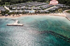 Sky view of the gated community with private beach and pool