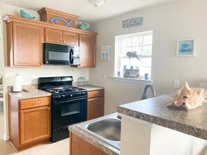 Fully size kitchen and well equipped with cooking utensils.