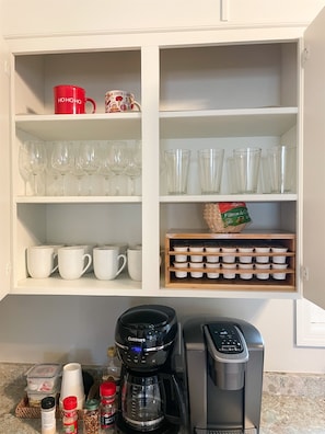 The kitchen comes equipped with a Keurig as well as K-cups from Charleston Coffee Roasters. We include starter cream and sugar as well.
