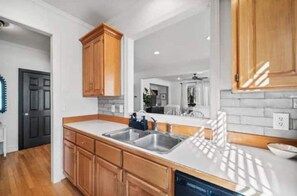 Kitchen with brand new stove and fridge