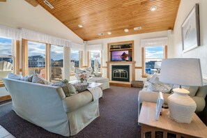 The Top-Level Living Area is perfect for getting some sunlight and watching your favorite shows!