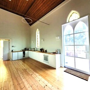 The well equipped kitchen connects to the outdoor entertaining area