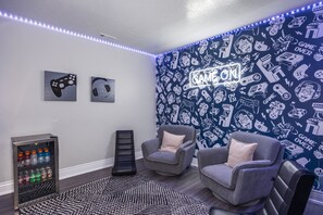 Enjoy our game room with Xbox- X and 4 controllers.