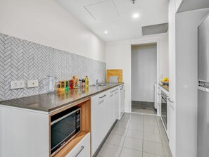 Stone bench tops with microwave under bench