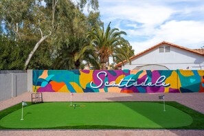 Play a game of putt putt- mural painted by local Scottsdale Artist