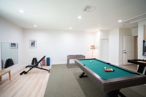 Gameroom/Gym with pool table, shuffleboard and foosball