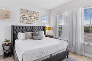 Luxe Bedroom of the Townhouse in Davenport Florida - Attached bathroom for convenience - Comfy Double bed - Stunning outside views