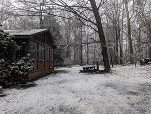 Porch and picnic table in snow