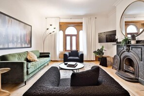 Spacious living room with electric fireplace!