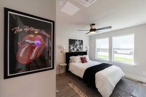 First floor bedroom with queen bed and en suite bathroom.