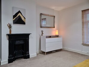 Original fireplace in master bedroom