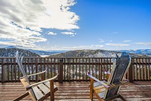 The expansive house deck lets you take in all the views from our custom adirondack chars.