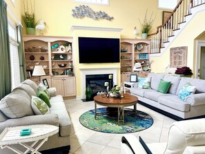 Open living room with 77 inch OLED TV