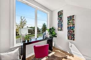 Bright and airy space to catch up on your emails while people watching. 