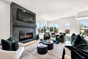 First floor living area with large ROKU TV, perfect for watching your shows.