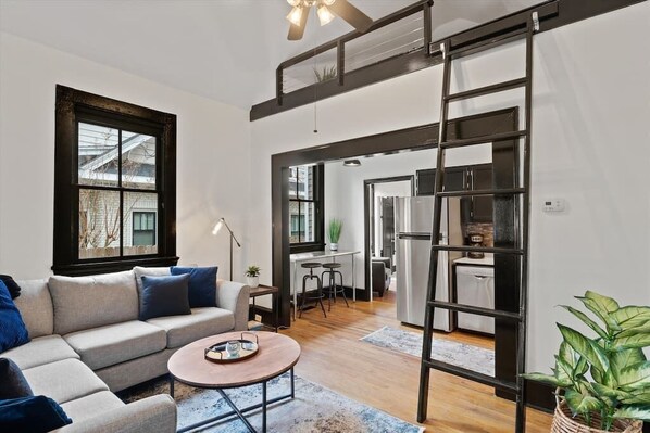 Living room with 2 story ceiling making it feel extra spacious