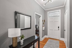 Entry foyer with guest bedroom to left