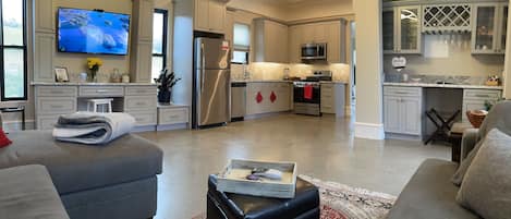 The spacious open concept Living Room is light and airy with sweeping views.