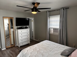 MainBDRM,smart TV , mirrored closet doors, ceiling fan