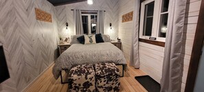 Comfy Queen size bed with100% cotton sheets. Outlets and lighting on either side